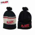RAW X ROLLING PAPERS POMPOM HATS